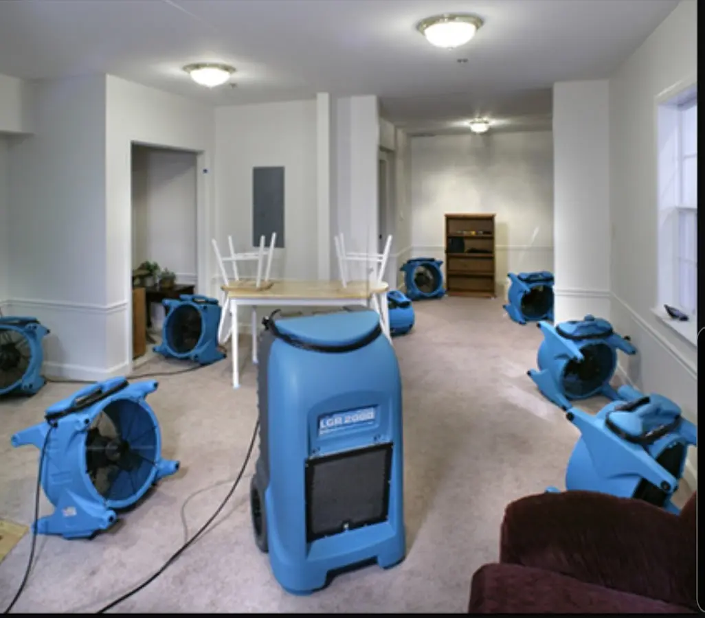 Air movers and dehumidifier setup for Water Damage Restoration in Shelby